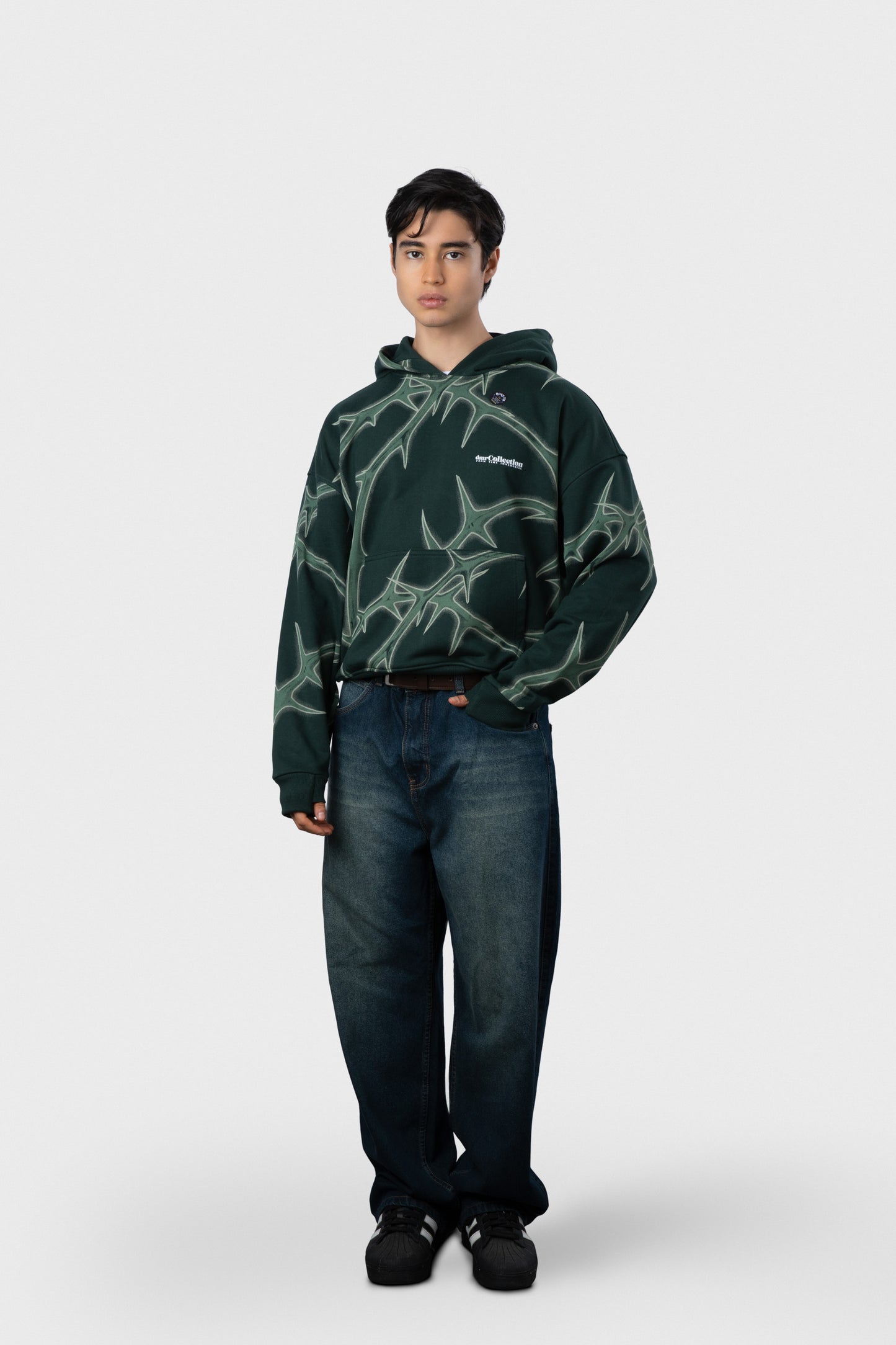 POLERA CON CAPUCHA DRUS