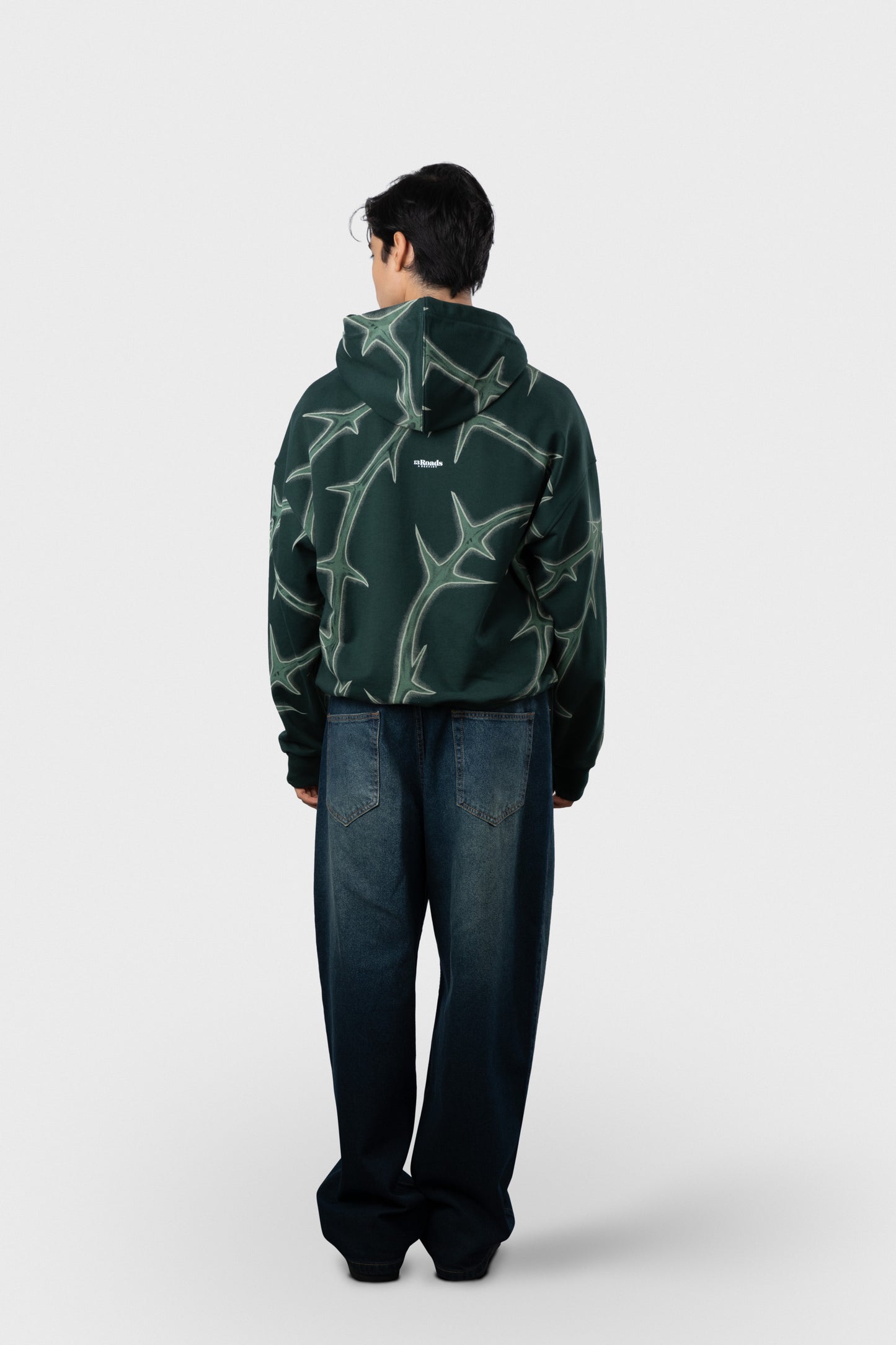 POLERA CON CAPUCHA DRUS