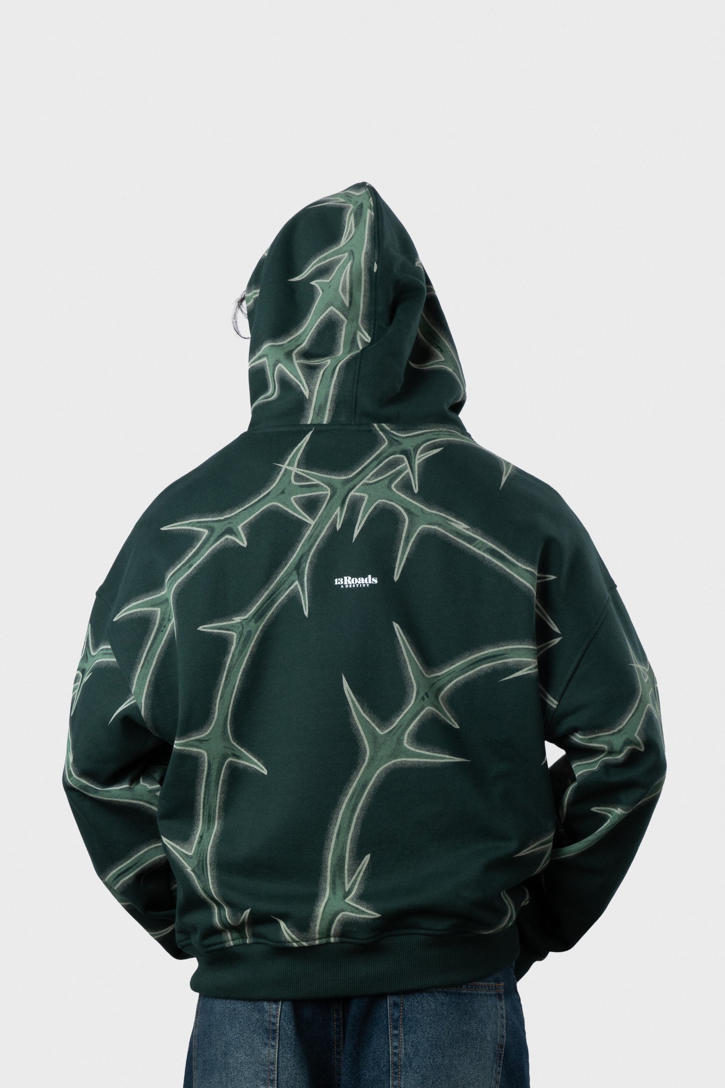 POLERA CON CAPUCHA DRUS